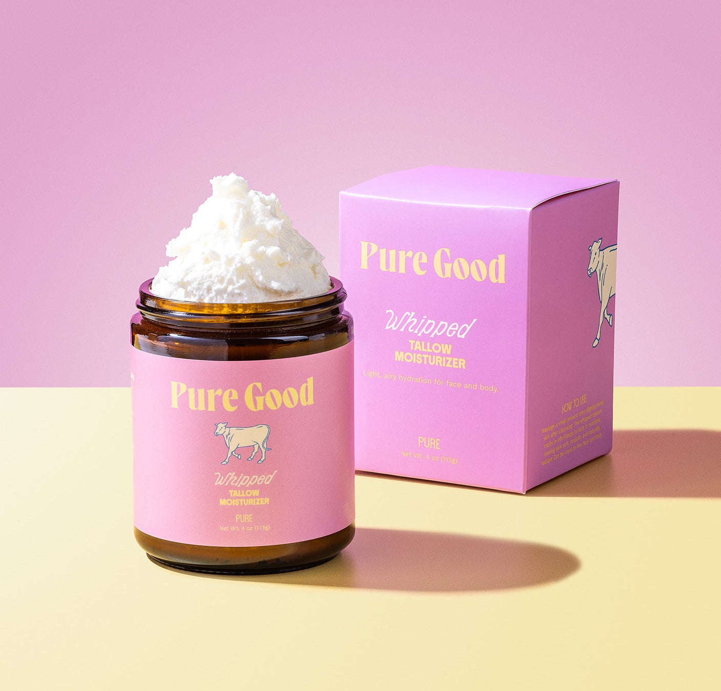 Jar of whipped cream with 'Pure Good' packaging on a pink and yellow gradient background